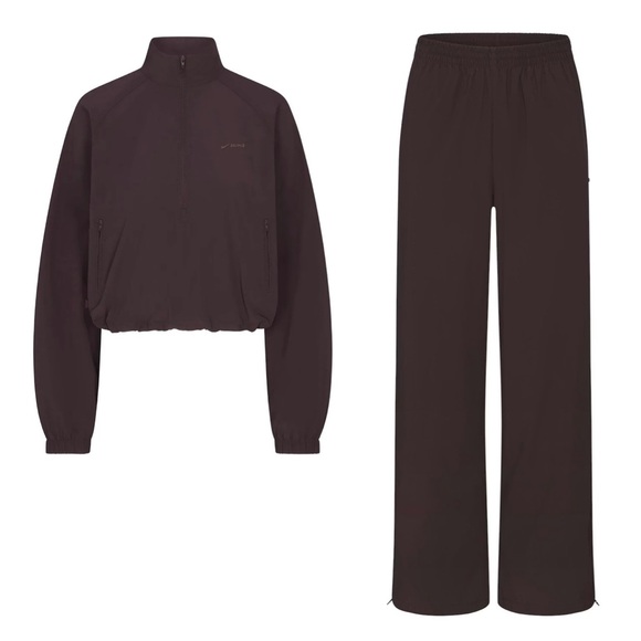 SKIMS Pants - Nike Skims Woven Nylon Half Zip Jacket & Oversized Track Pant Set - Phoenix